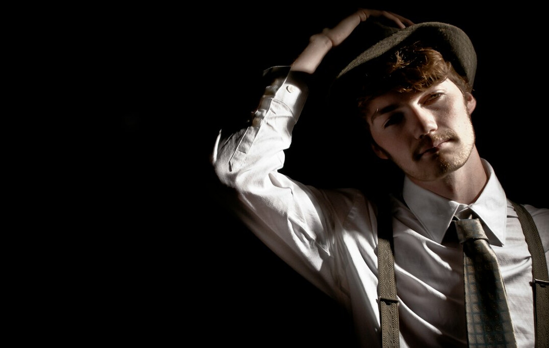 Studio portrait of a young male archivist